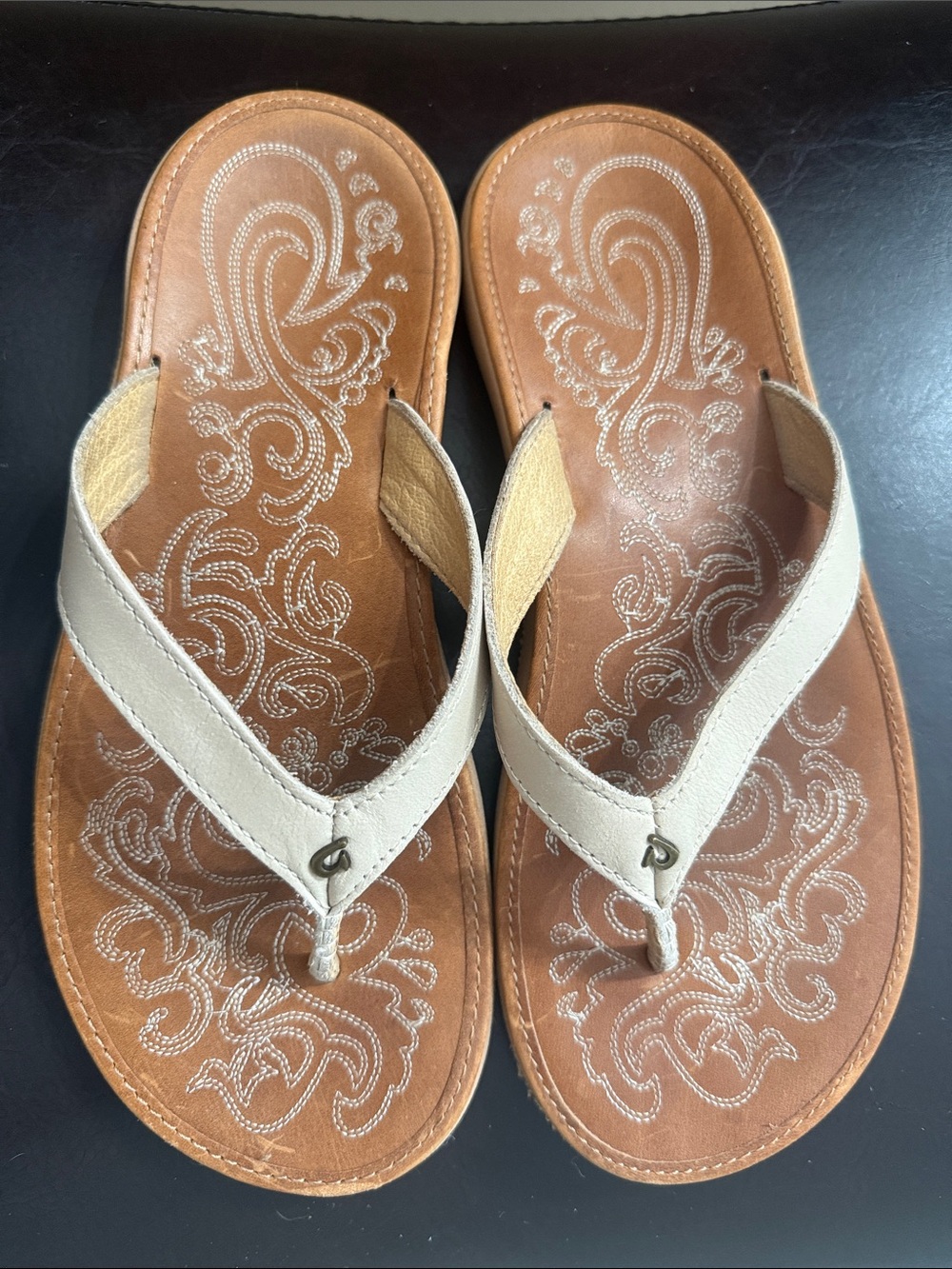 OluKai Women’s Cream Leather Flip Flop Sandals - Casual Comfort